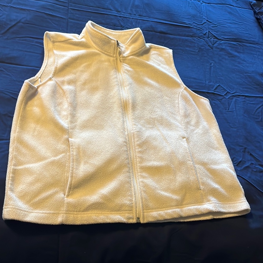 Winter white sleeveless vest.